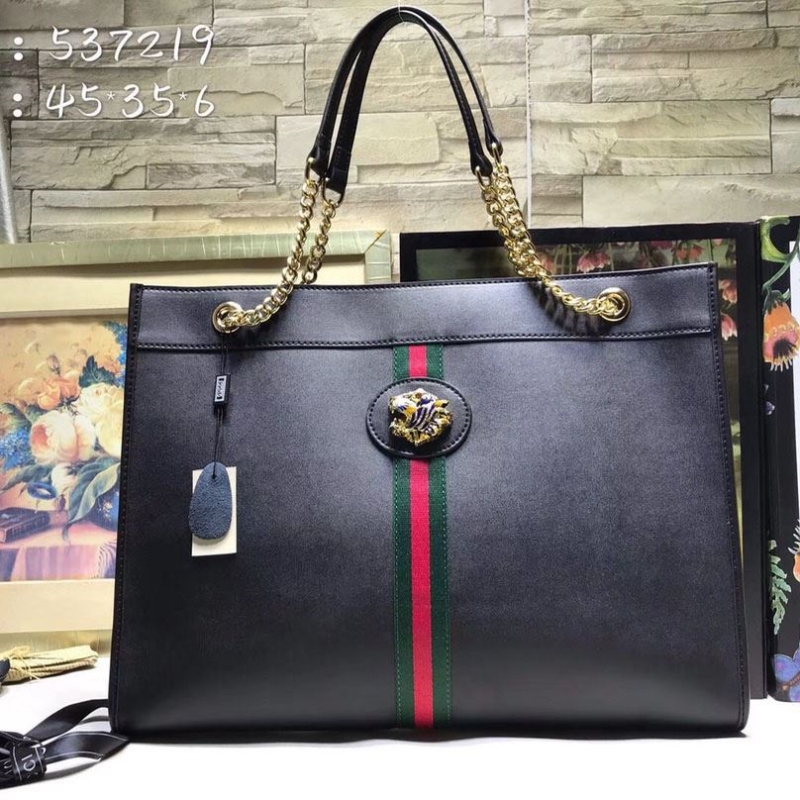 G*u*i shopping bags